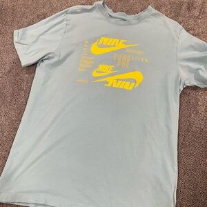 Nike Men's Sky Blue Tee with Vibrant Yellow Logo